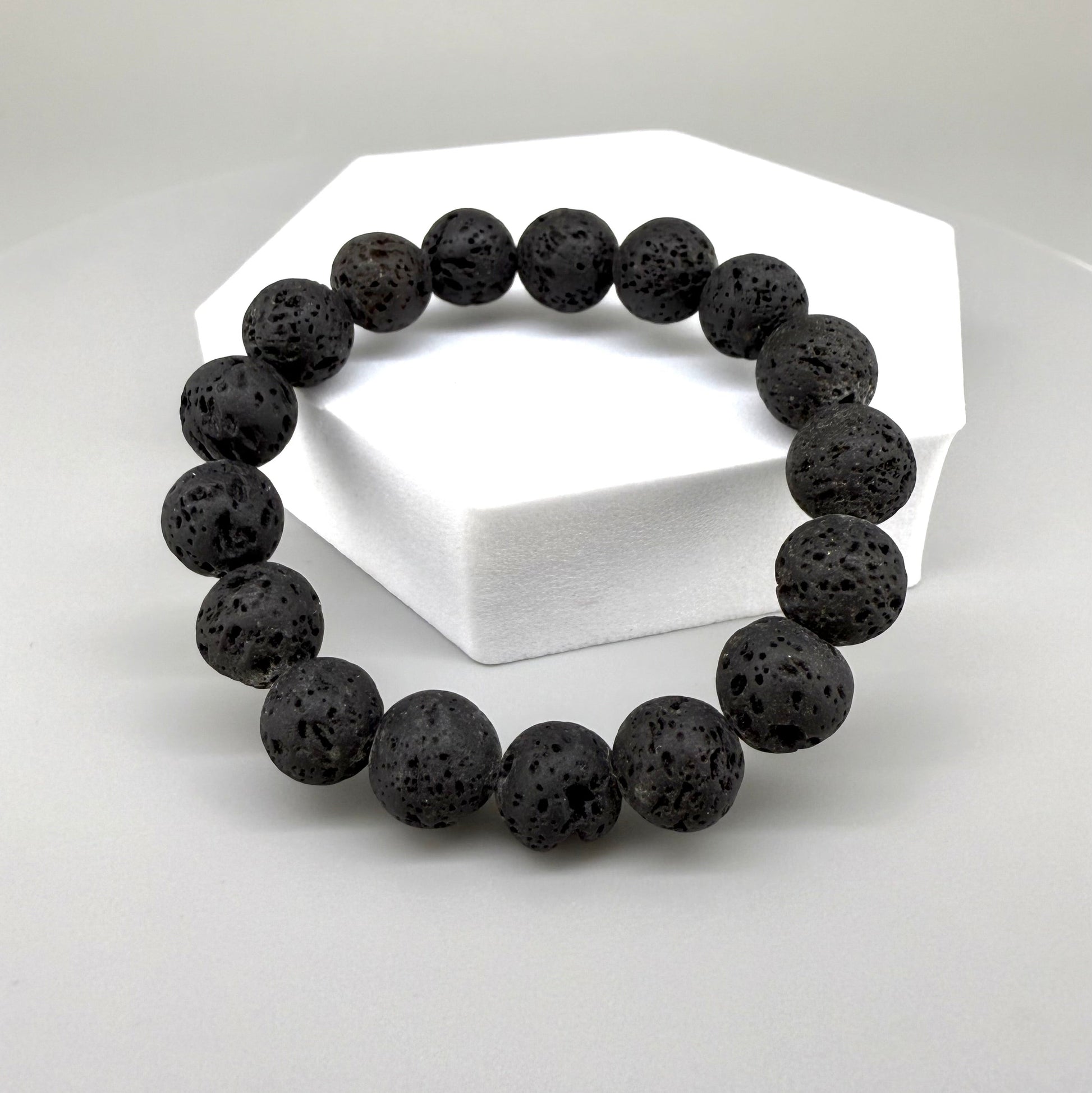 Lava beaded bracelet, 16cm, natural matte black porous gemstone beads on elastic stretch band.