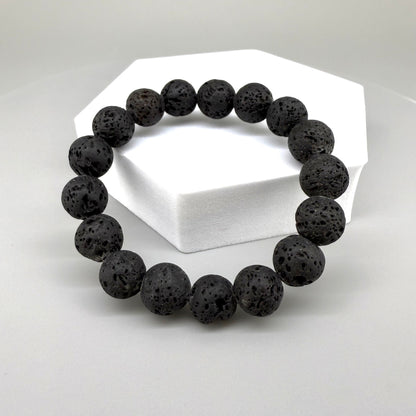 Lava beaded bracelet, 16cm, natural matte black porous gemstone beads on elastic stretch band.