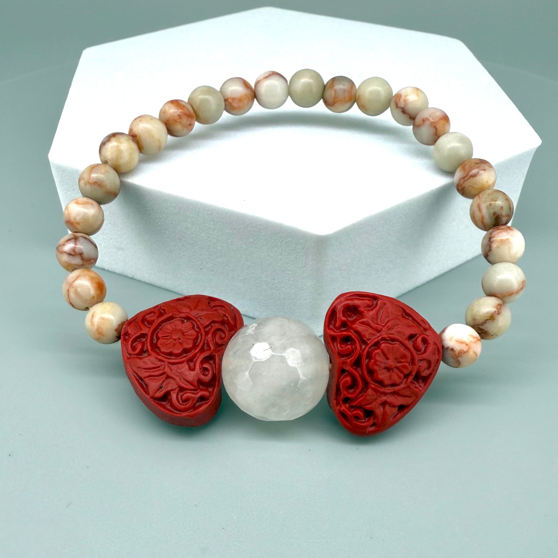 Jasper beaded bracelet, 16cm, natural earthy gemstone beads with red cinnabar-style heart and rose quartz accent on elastic stretch band.
