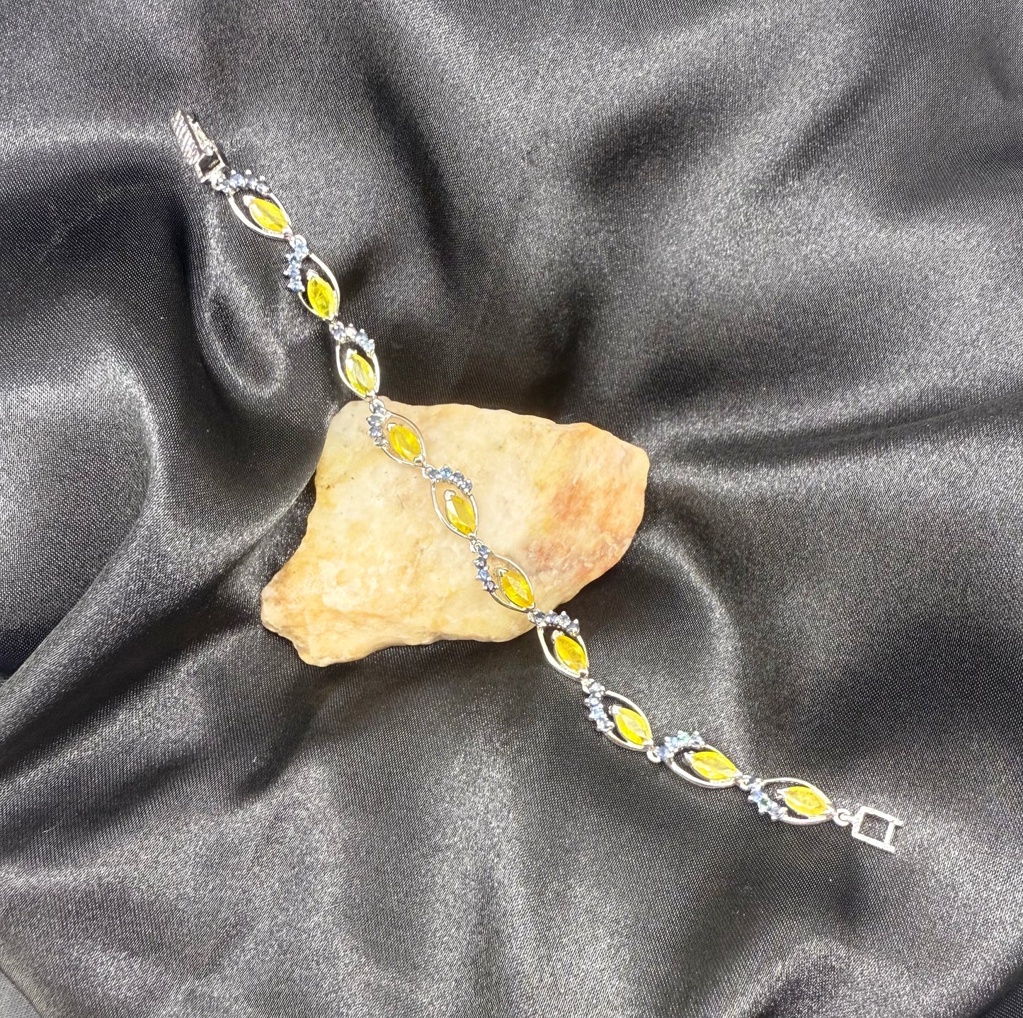 Sapphire bracelet with yellow and blue gemstones set in white gold plated silver