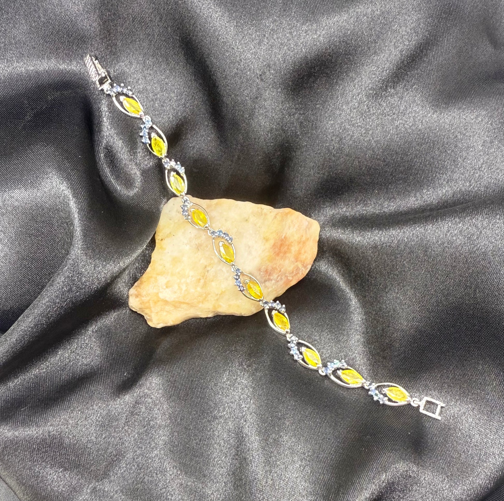 Sapphire bracelet with yellow and blue gemstones set in white gold plated silver