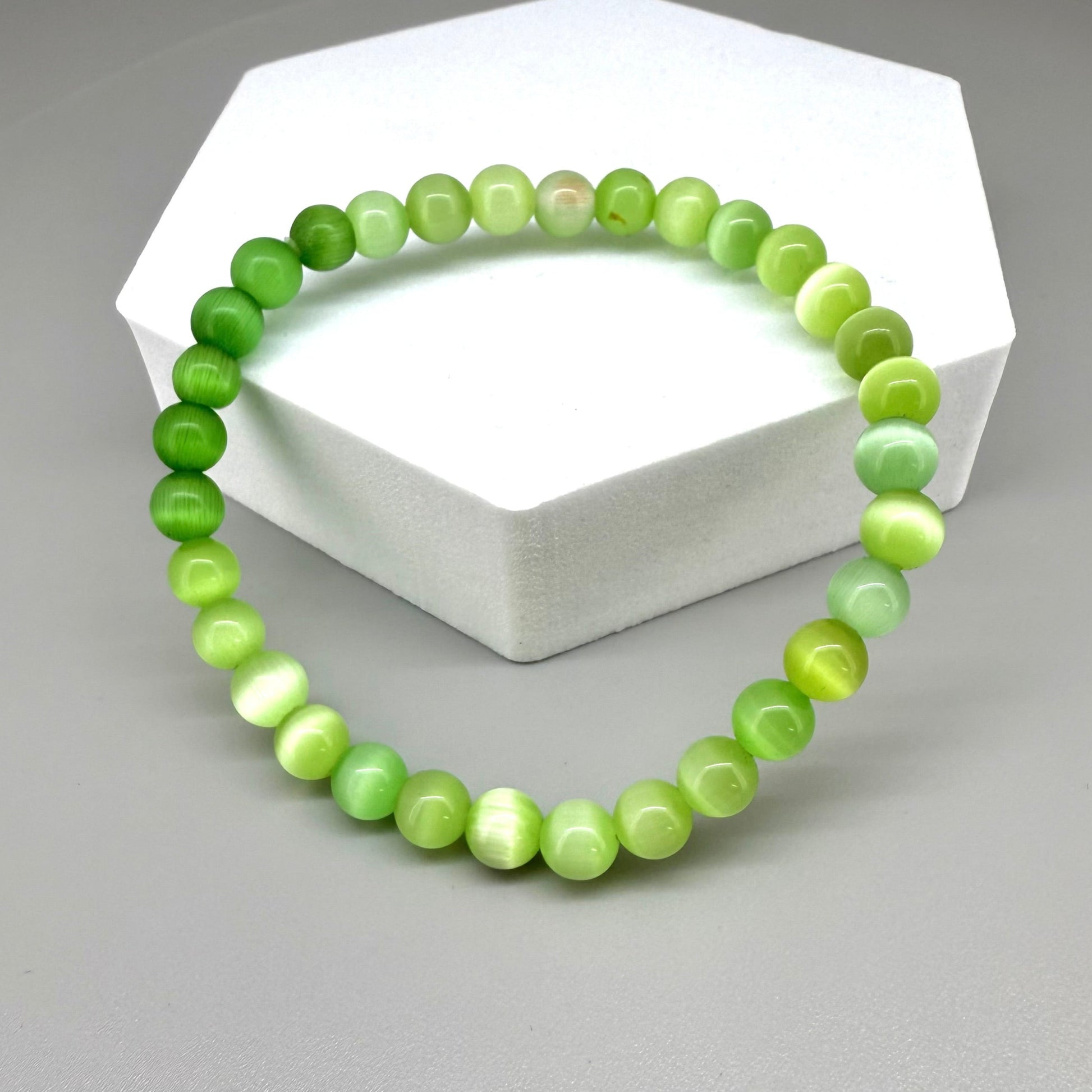 Cat’s Eye beaded bracelet, 18cm, natural shimmering grey gemstone beads on elastic stretch band.