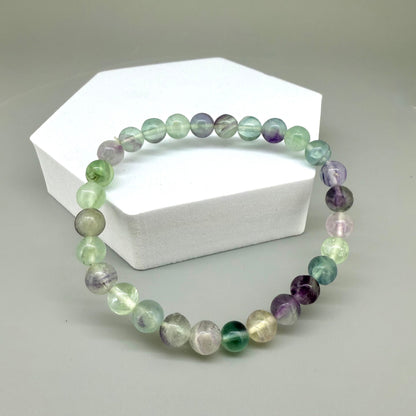 Fluorite beaded bracelet, 18cm, natural gemstone beads in mixed pastel tones on elastic stretch band.