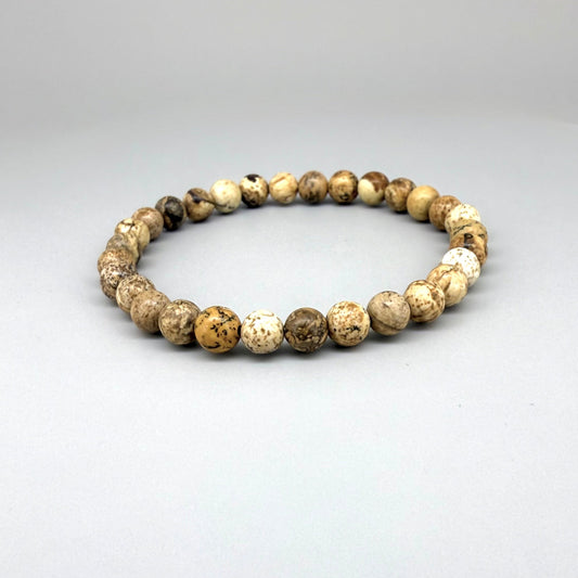 Jasper beaded bracelet, natural gemstone beads in light earthy tones on elastic stretch band.
