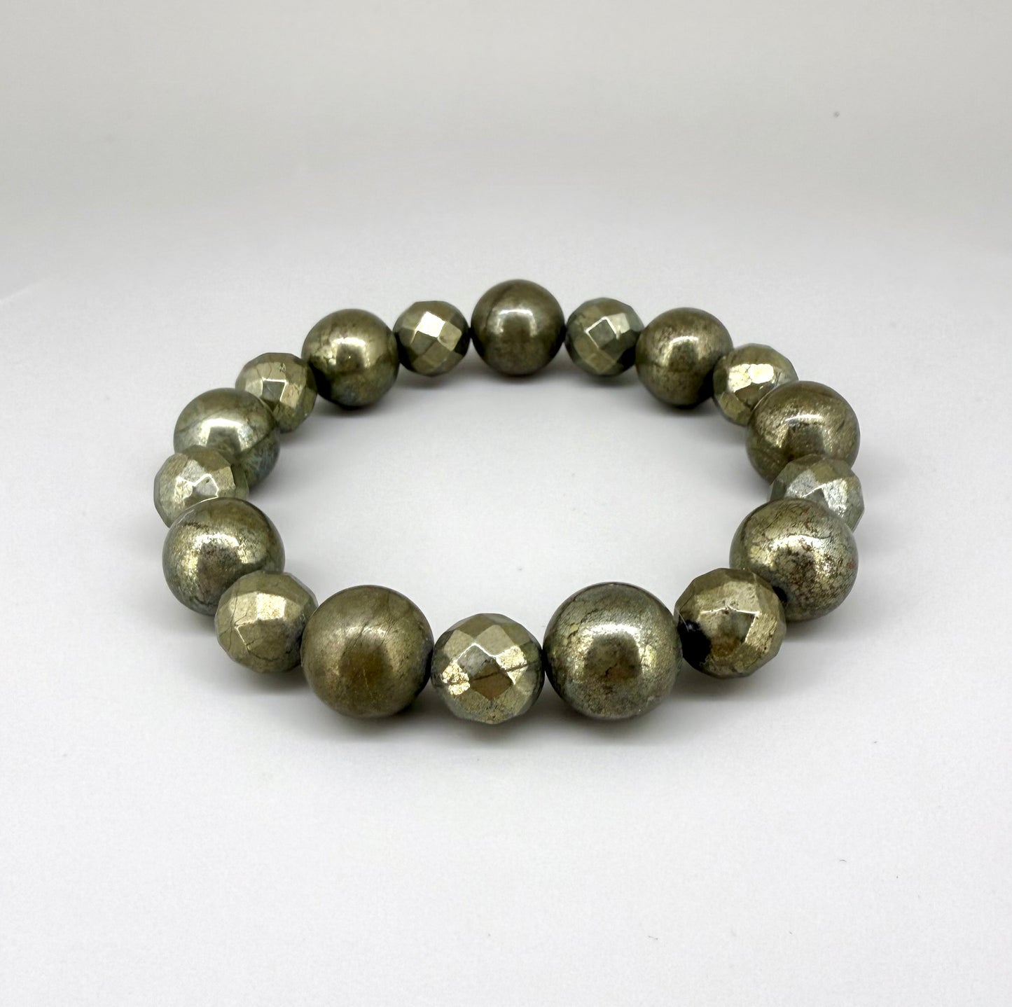 Pyrite beaded bracelet, 20cm, metallic golden-grey gemstone beads on elastic stretch band.