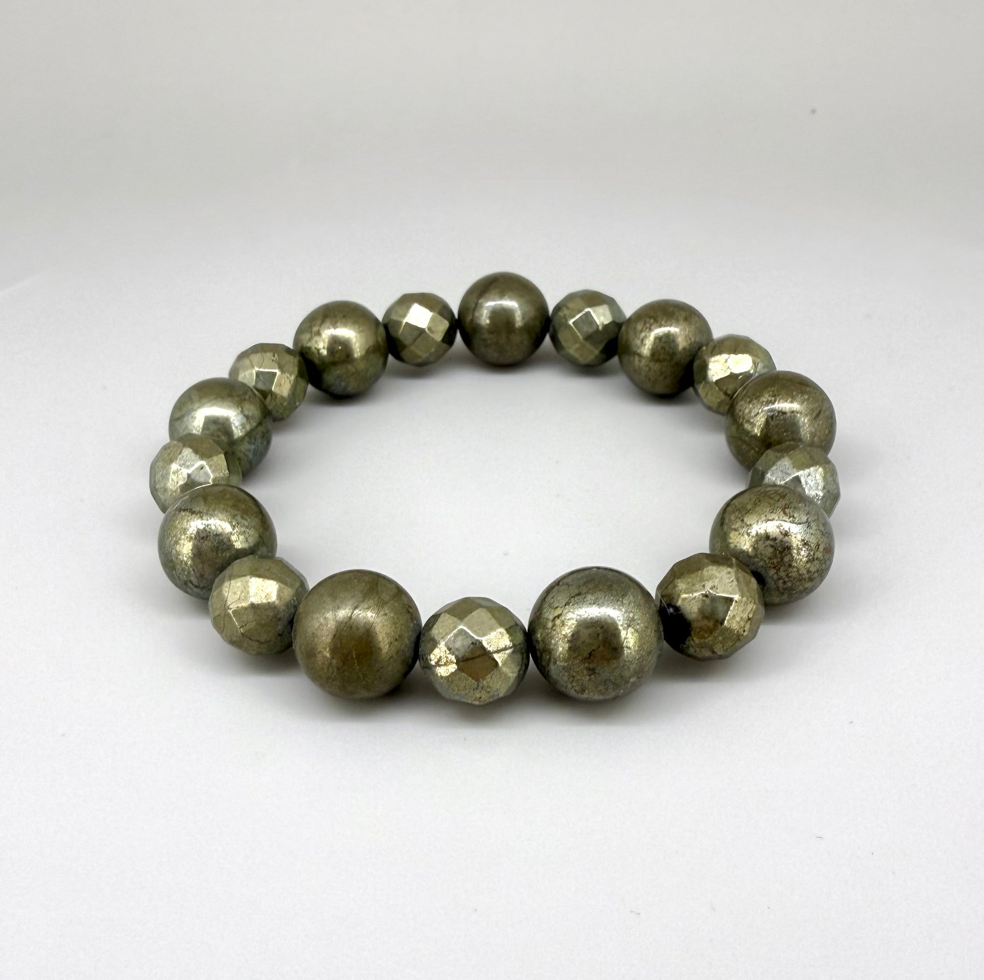 Pyrite beaded bracelet, 20cm, metallic golden-grey gemstone beads on elastic stretch band.