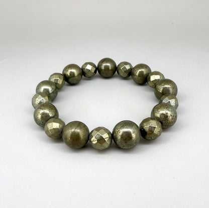 Pyrite beaded bracelet, 20cm, metallic golden-grey gemstone beads on elastic stretch band.