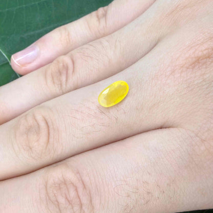 0.84 ct natural yellow opal from Africa, polished gemstone.