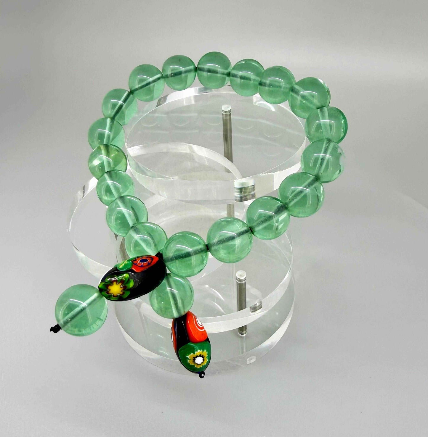 Green quartz mala bracelet made from natural green quartz beads, symbolizing balance, renewal, and emotional harmony.