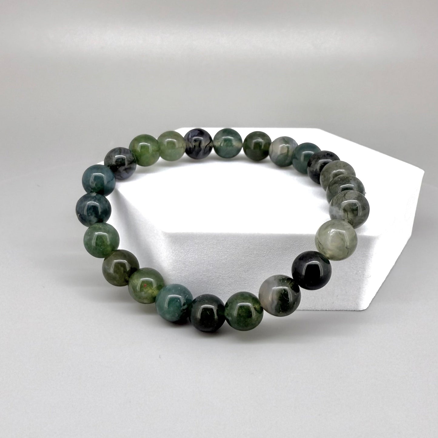 Moss agate beaded bracelet, 18cm, natural green and white gemstone beads with moss-like patterns on elastic stretch band.