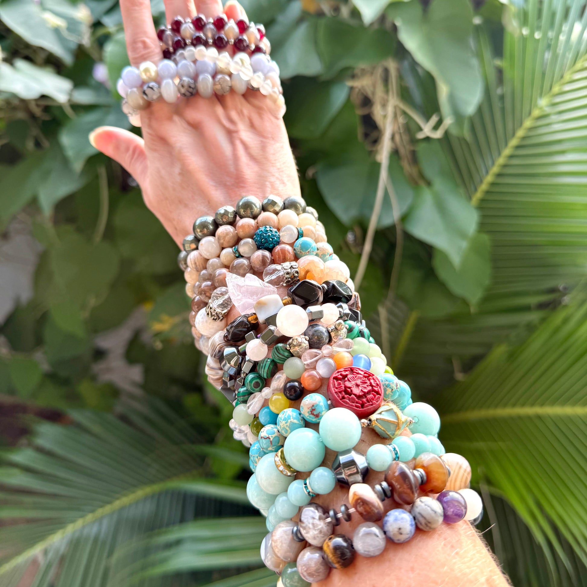 Multi Natural Beaded Gemstone Bracelets worn on arm