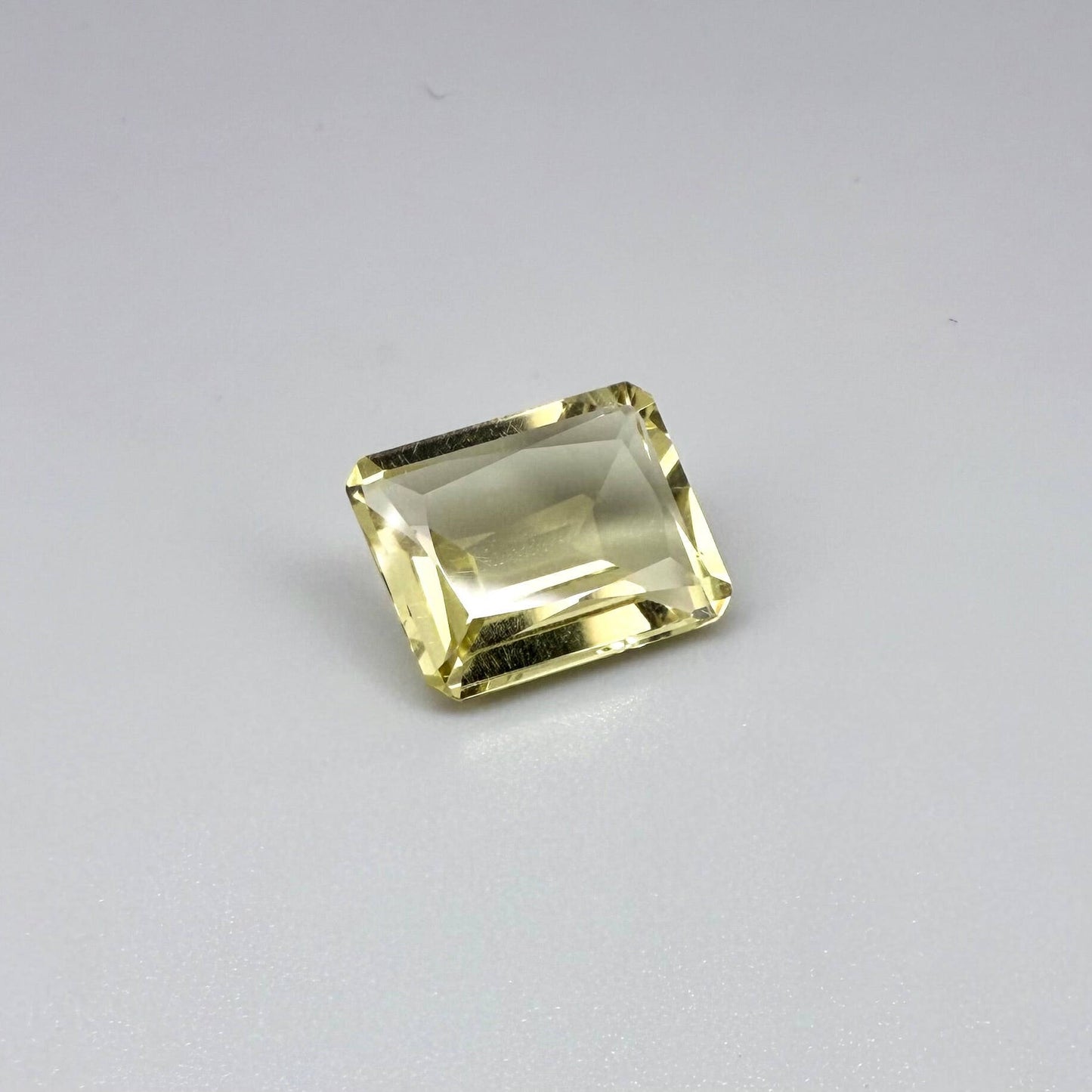 5.6 ct natural lemon quartz, faceted with bright yellow color.