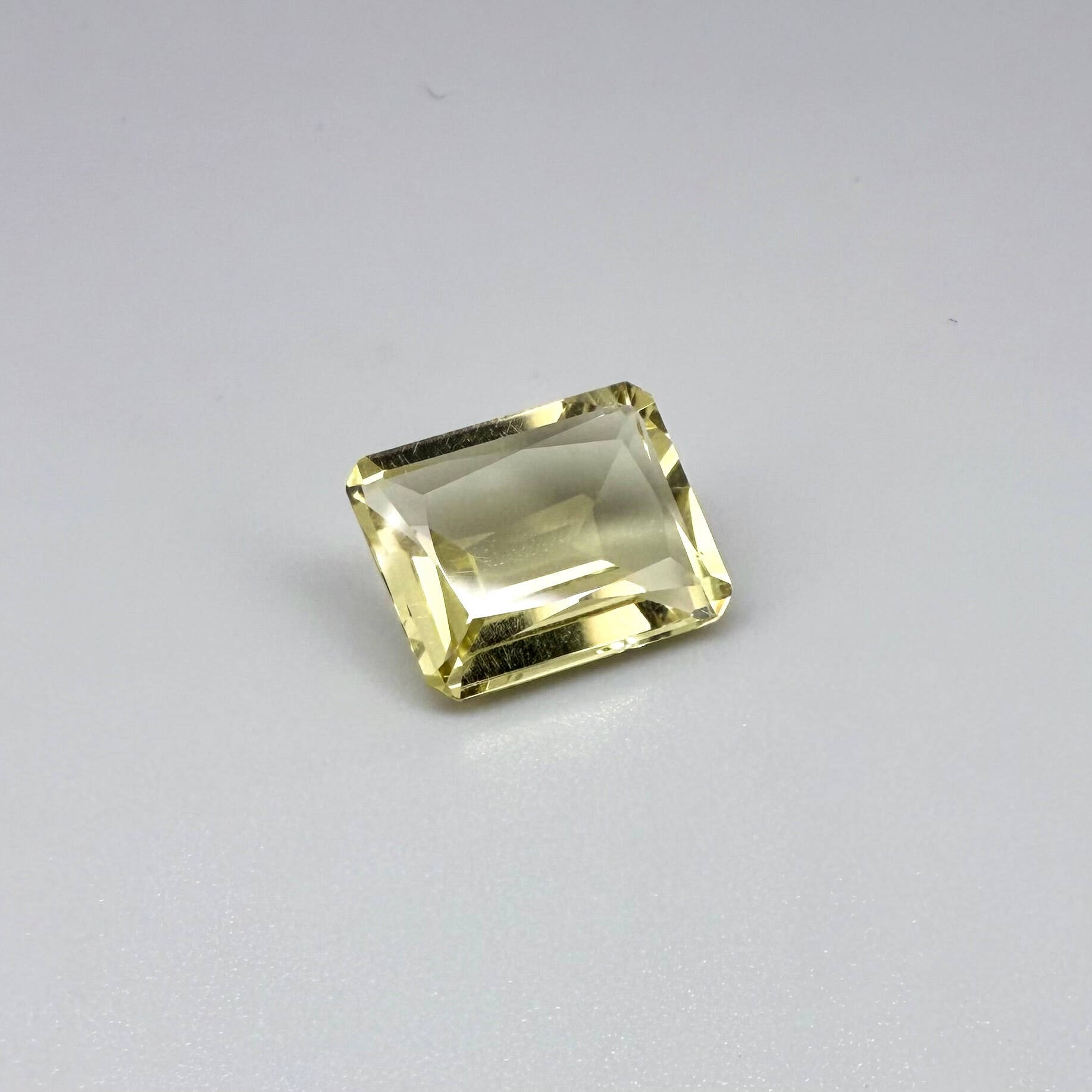 5.6 ct natural lemon quartz, faceted with bright yellow color.