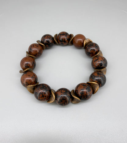 Mahogany obsidian beaded bracelet, 17cm, natural brown and black gemstone beads with copper-colored spacer accents on elastic stretch band.