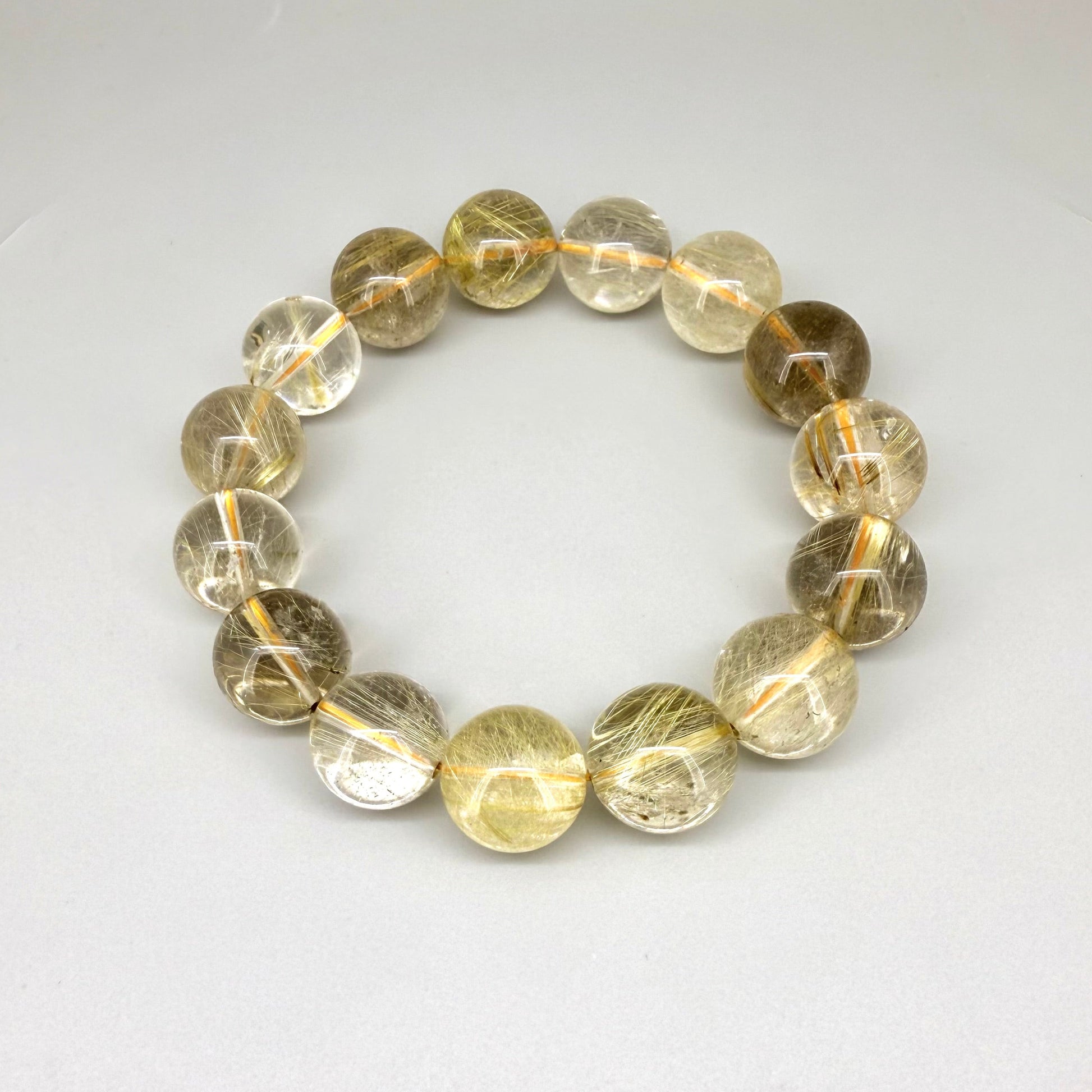 Rutilated quartz beaded bracelet, 18cm, natural gemstone beads with golden rutile threads on elastic stretch band