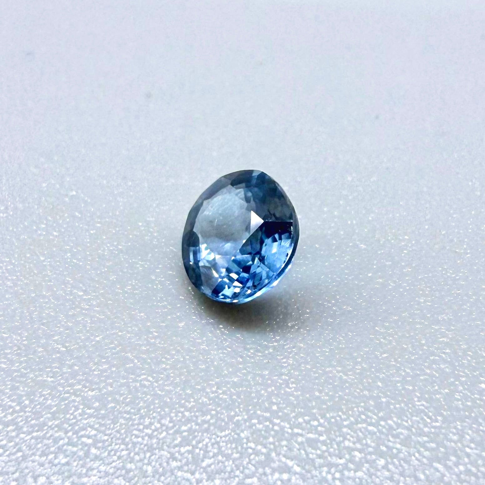 0.84 ct natural bright-blue sapphire from Bangkaja, oval cut