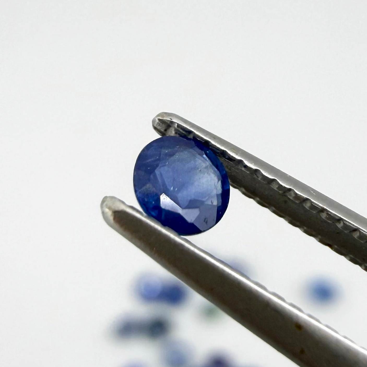 2.8 ct natural sapphire lot from Bangkaja with blue, green and purplish hues, round cut stones.