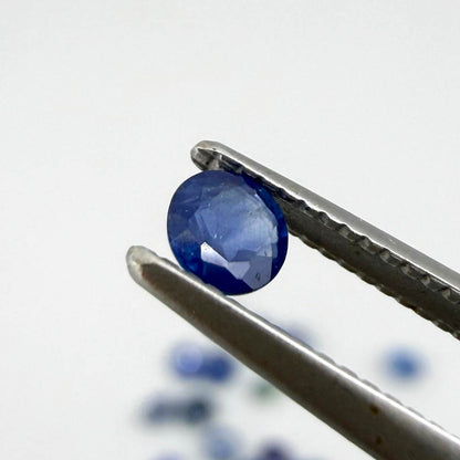 2.8 ct natural sapphire lot from Bangkaja with blue, green and purplish hues, round cut stones.