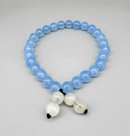Blue jade mala bracelet made from natural blue jade beads, designed for harmony, emotional balance, and everyday wear.