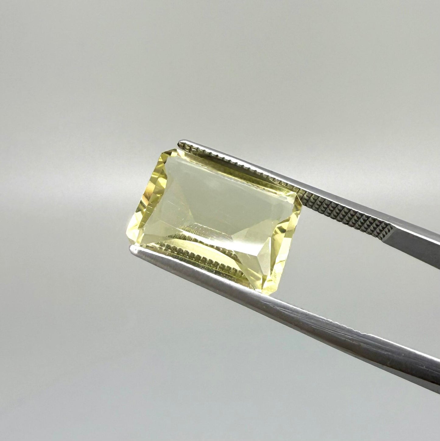 5.6 ct natural lemon quartz, faceted with bright yellow color.
