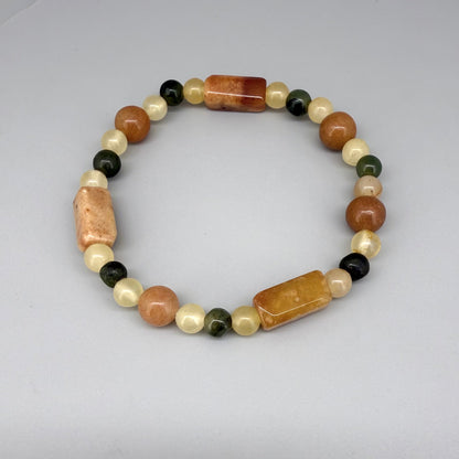 Jade beaded bracelet, 19cm, orange square stones with round beads in orange, green, and beige tones on elastic stretch band.