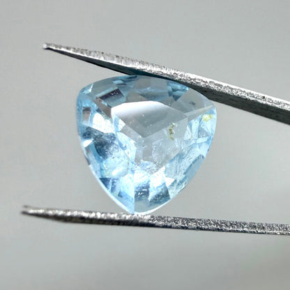 Bi-Color (White, Swiss Blue Inclusions) Topaz Trillion 3.54 Ct