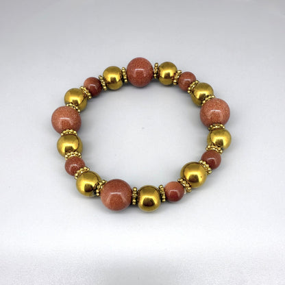 Hematite and goldstone beaded bracelet, 18cm, metallic gold and shimmering golden-copper beads on elastic stretch band.