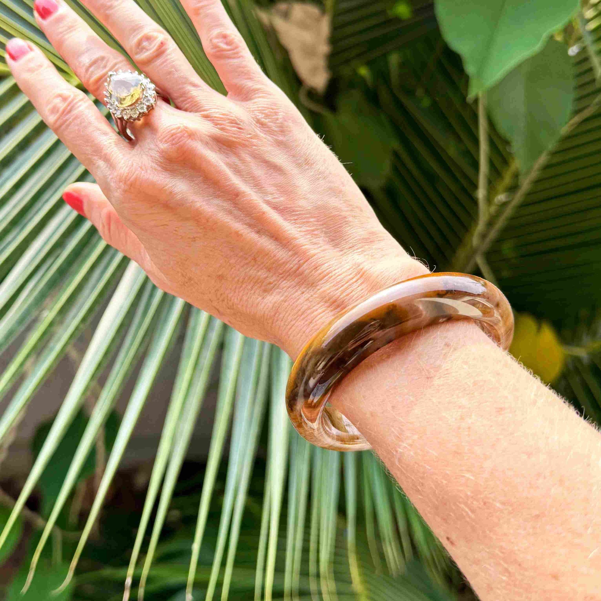 Natural jade bangle bracelet in beige and brown tones, smooth polished finish, 18 cm inner circumference