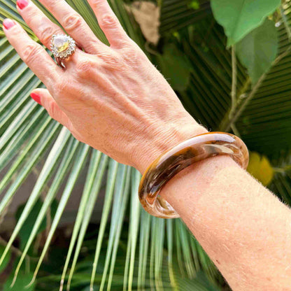 Natural jade bangle bracelet in beige and brown tones, smooth polished finish, 18 cm inner circumference