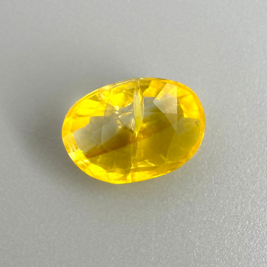 Bi-Color (White, Yellow-Orange) Fire Opal Oval 0.8 Ct