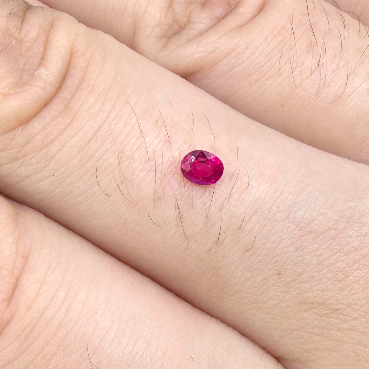 0.18 ct natural Songea ruby, oval cut.