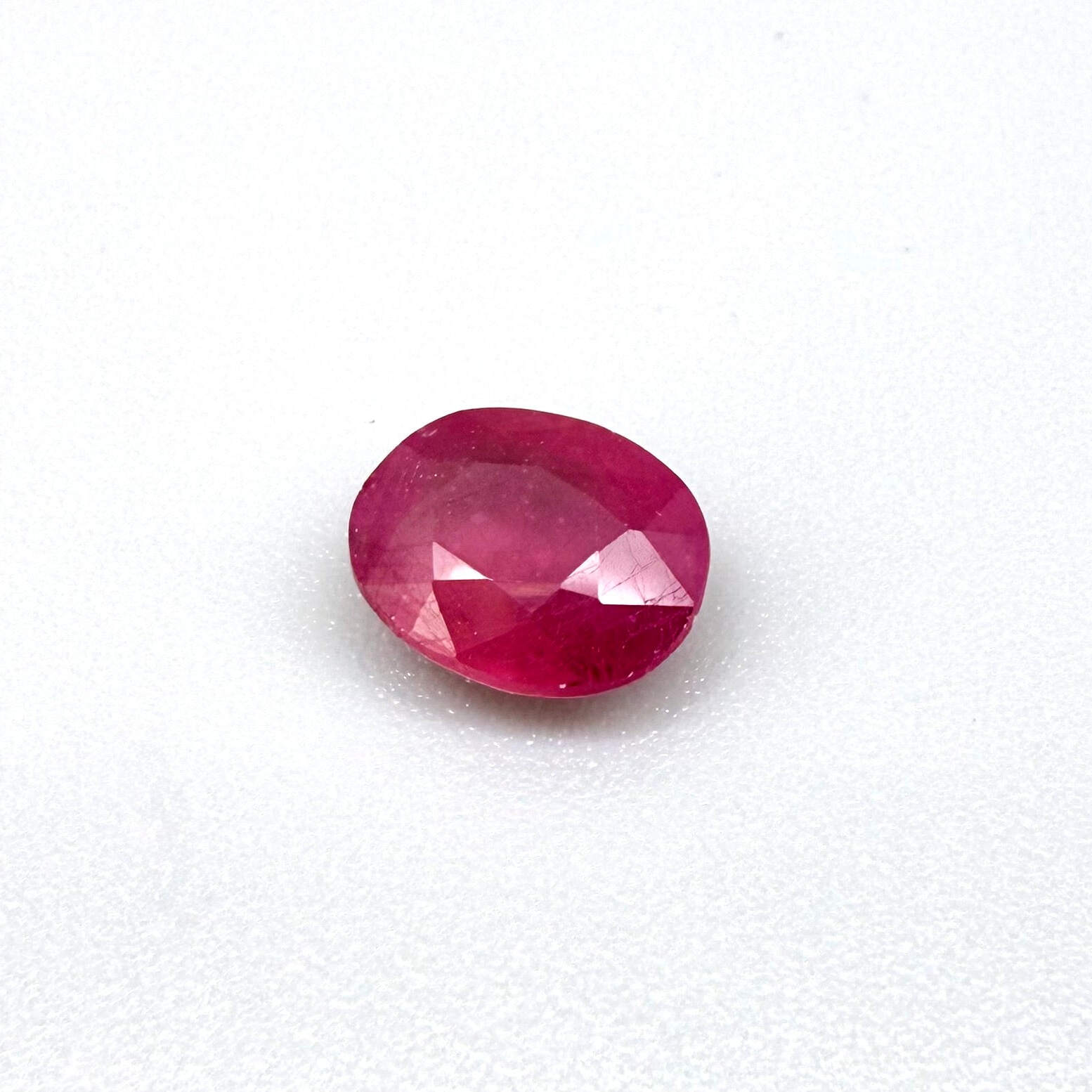 2.2 ct natural pink-red Mozambique ruby, oval cut.