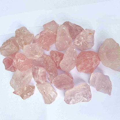 Natural rose quartz rough stones, untreated pink quartz in raw form for lapidary and jewelry projects