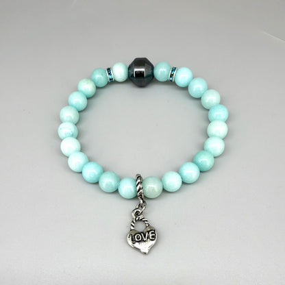 Agate beaded bracelet, 19cm, aqua-blue gemstone beads with decorative medallion accent on elastic stretch band.