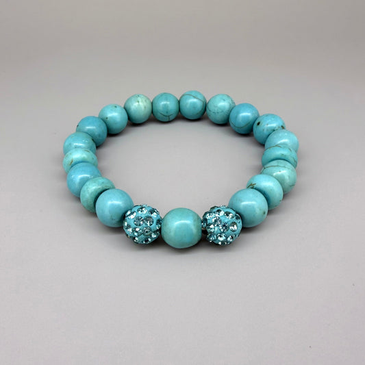Howlite beaded bracelet, 18cm, white gemstone beads with grey veining and two sparkling accent beads on elastic stretch band.