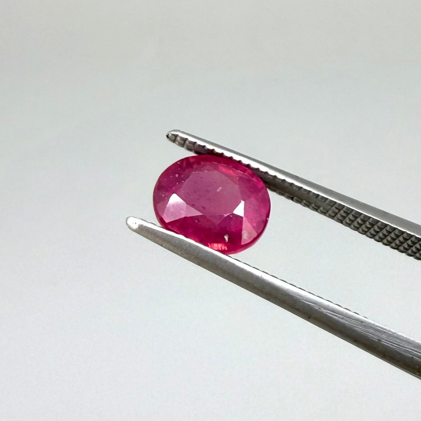 2.1 ct natural pink-red Songea ruby, oval cut.
