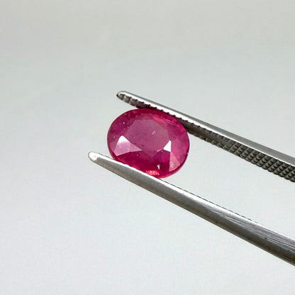 2.1 ct natural pink-red Songea ruby, oval cut.
