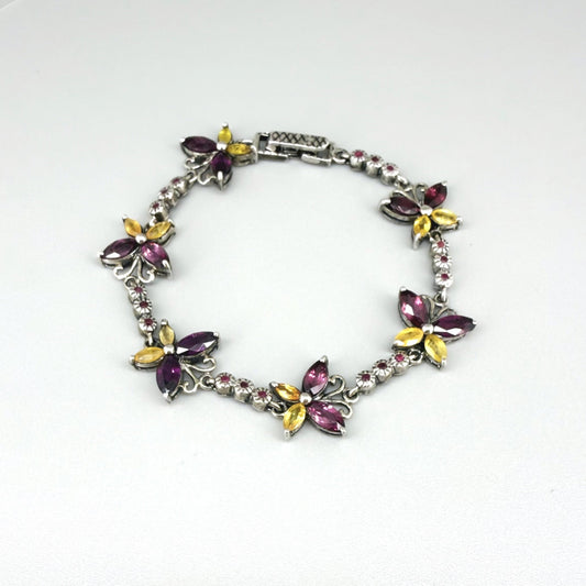 Gem Butterfly bracelet with rhodolite, sapphire and ruby gemstones set in white gold plated silver