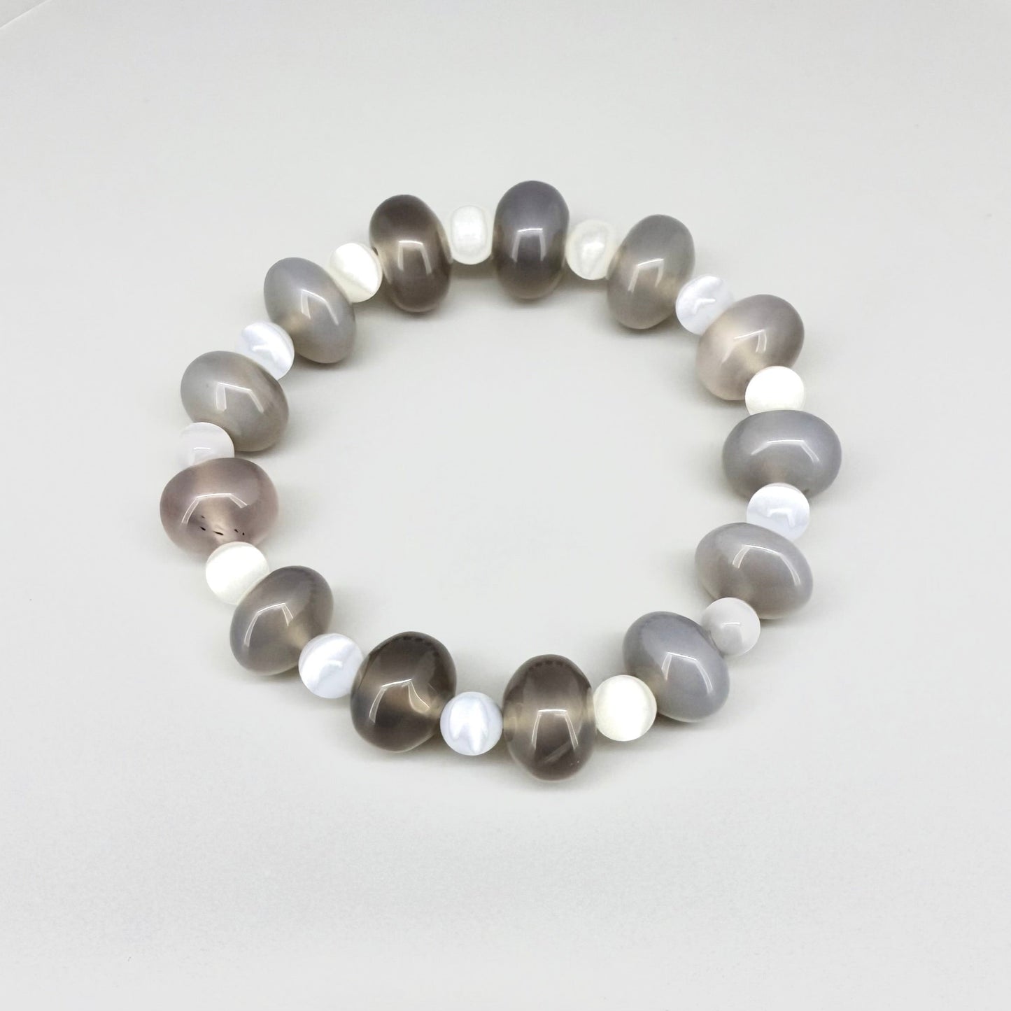 White cat’s eye and light grey agate beaded bracelet, 18cm, natural gemstone beads with soft shimmer on elastic stretch band.
