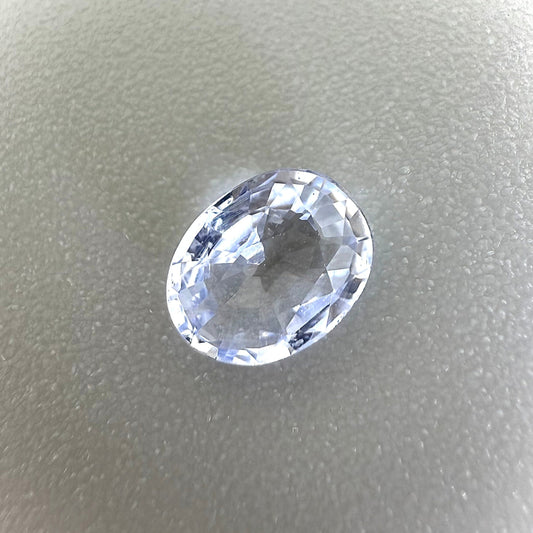 Bi-Color (White Pale Blue) Sapphire Oval 0.62 Ct