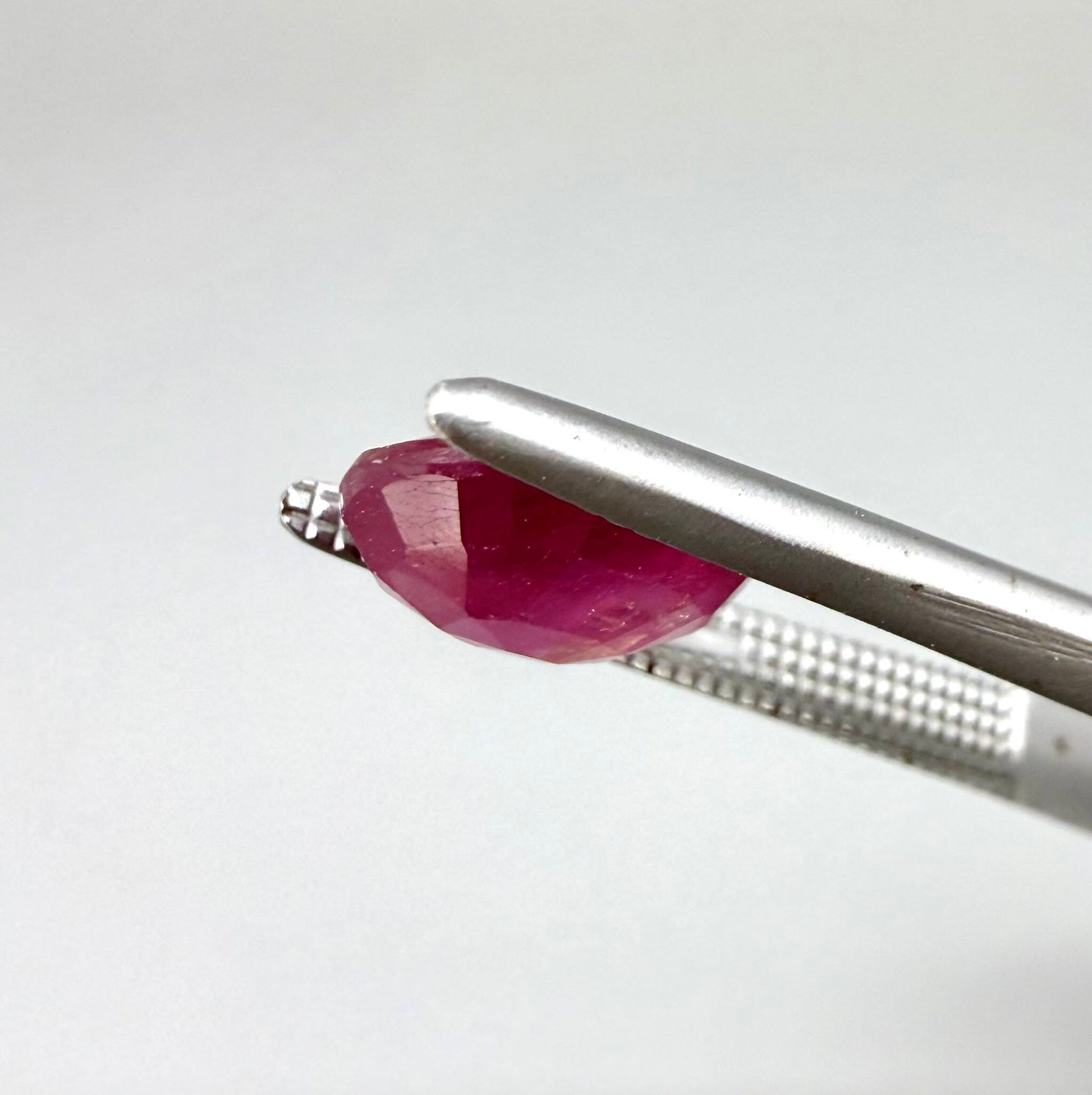 2.5 ct natural pink-red Mozambique ruby, oval cut.