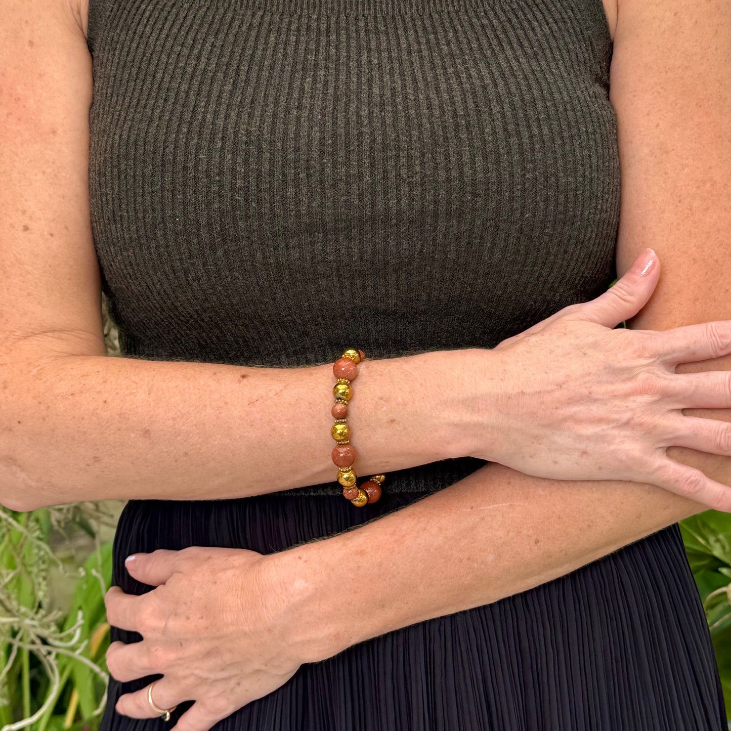 Hematite and goldstone beaded bracelet, 18cm, metallic gold and shimmering golden-copper beads on elastic stretch band.