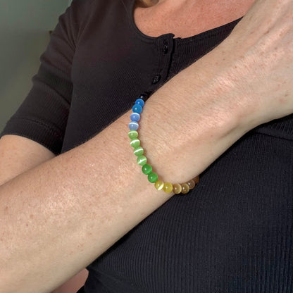 Cat’s Eye multicolor beaded bracelet, 18cm, natural gemstone beads with shimmering light effect on elastic stretch band.
