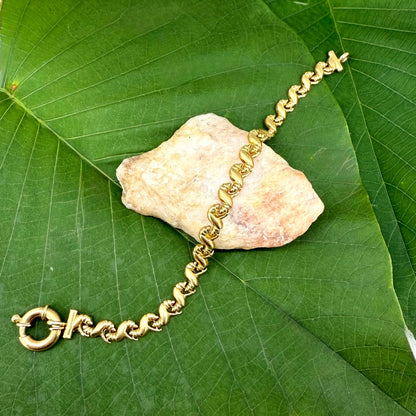 14k Italian vintage gold bracelet with twisted links and spring ring clasp, pre-loved, 11.13 g.