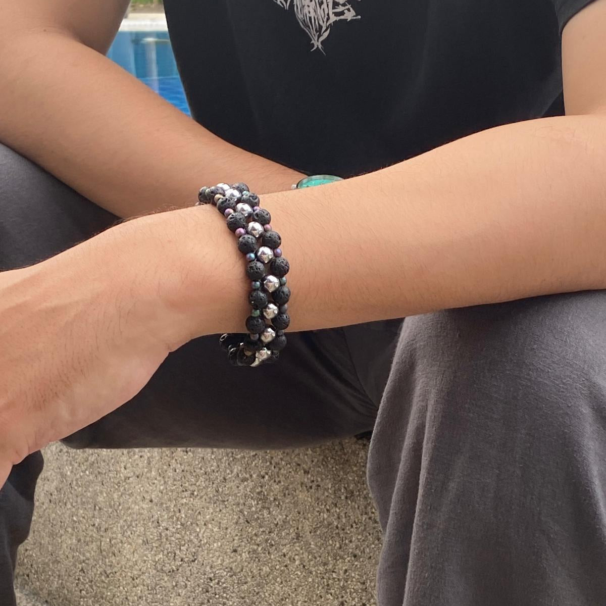 Lava and hematite beaded bracelet, natural matte black and metallic grey gemstone beads with spring ring clasp.