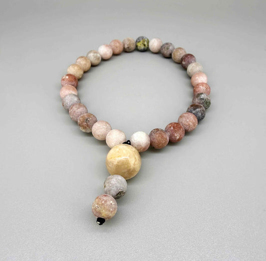 Maifanite mala bracelet made from natural maifanite beads, symbolizing grounding, stability, and balance.
