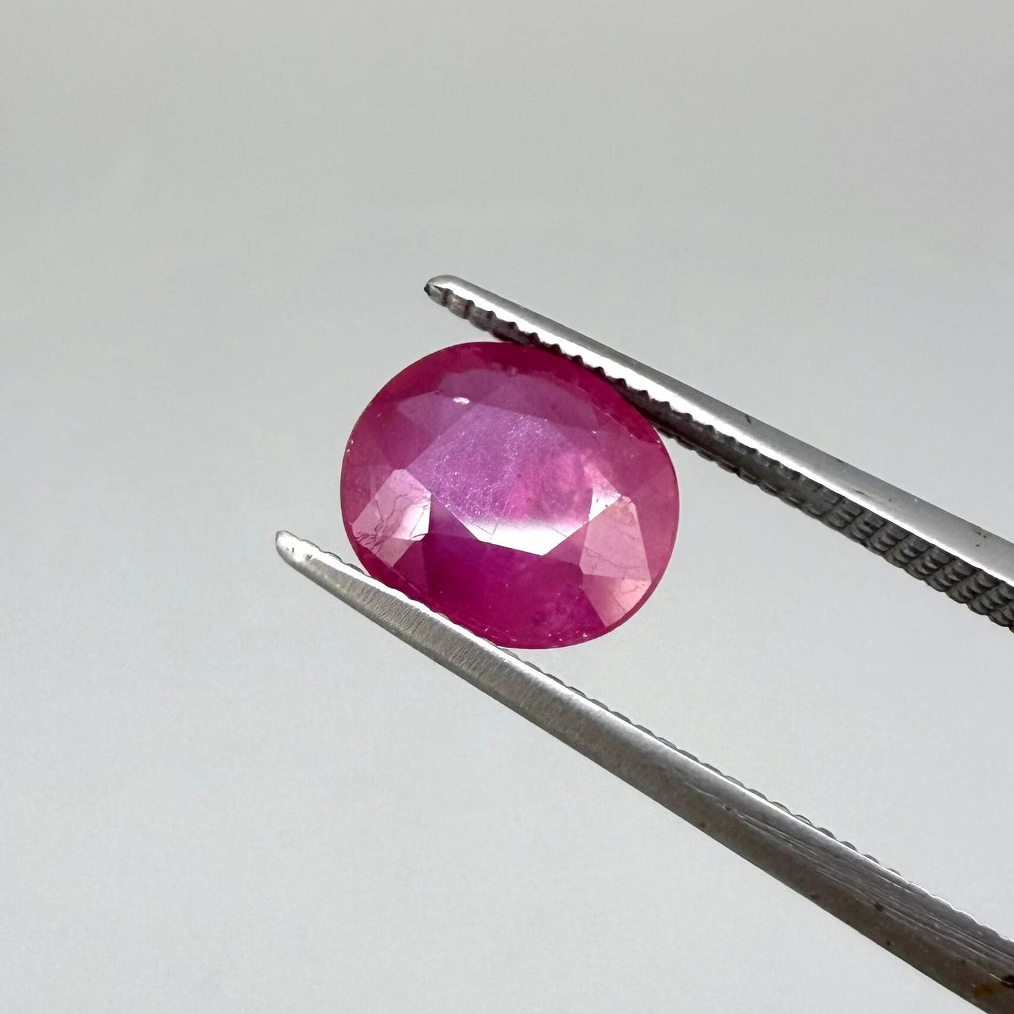 2.5 ct natural pink-red Mozambique ruby, oval cut.