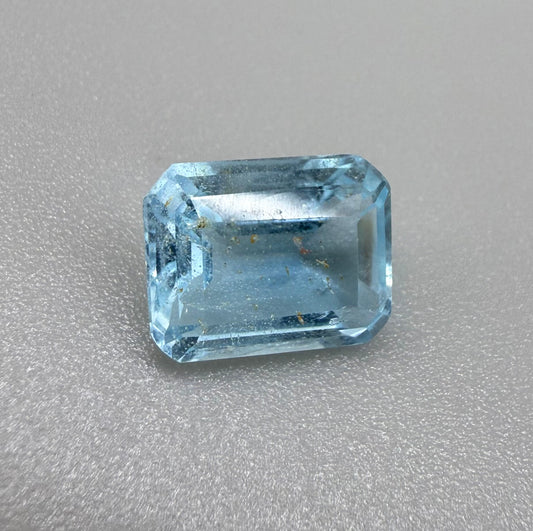 Swiss Blue Topaz with Gold Inclusions Emerald Cut 4.55 Ct
