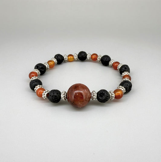 Alt-Text

Carnelian, lava, and cherry quartz beaded bracelet, 18cm, natural orange-red, matte black, and pink beads on elastic stretch band.