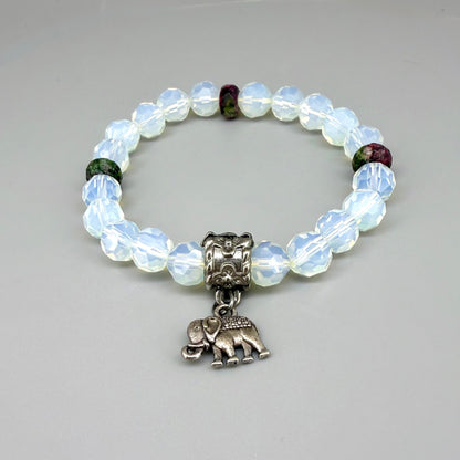 Opal and rhodochrosite beaded bracelet, 17cm, light crystal-blue and soft pink gemstone beads on elastic stretch band.